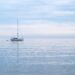 calm boat on still water representing feeling stuck in life